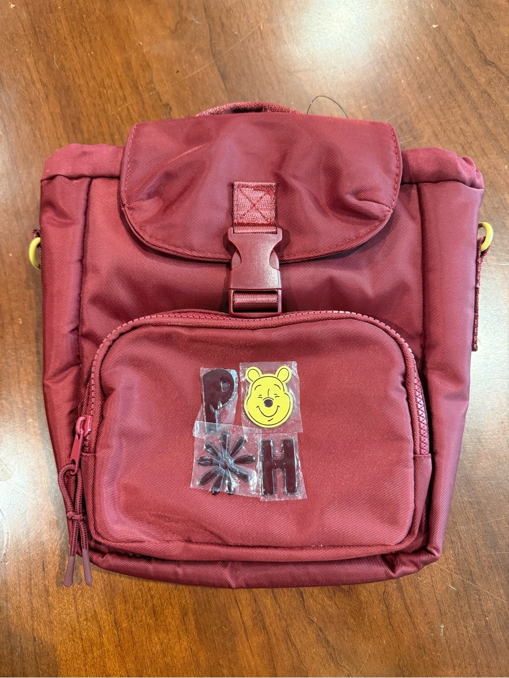 NWT Disney Winne The Pooh Burgundy Compact Crossbody Bag
